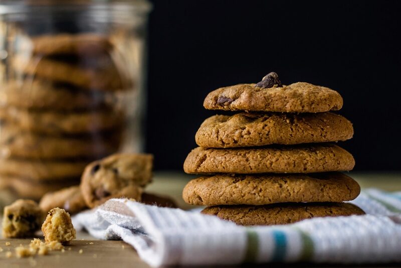 A stack of cookies against a dark background